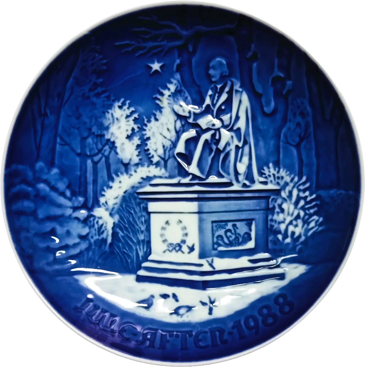 Piatto di Natale Bing & Grøndahl diametro 18 cm · Bianco; Blu · Edvard Jensen · Nel Giardino del Re · B&G-CP-1988