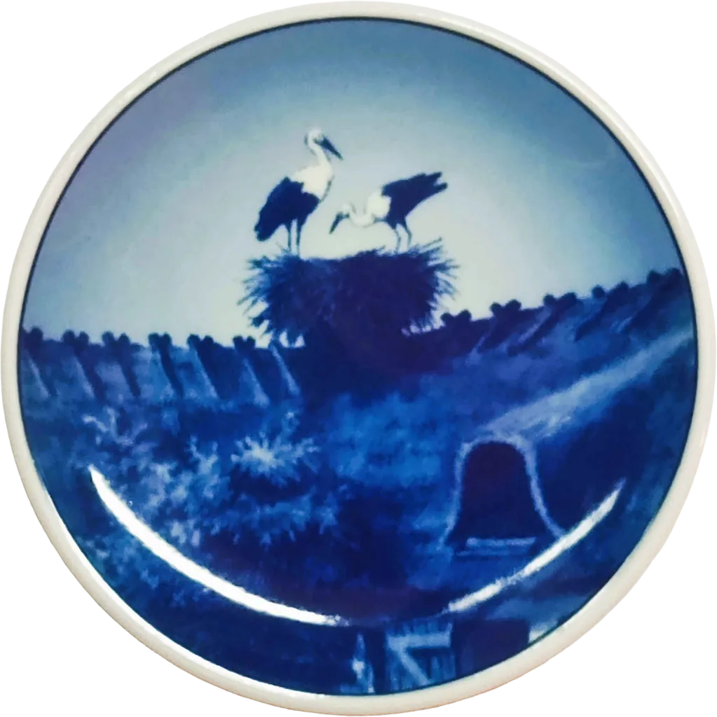 Placchetta Serie 2010 Royal Copenhagen diametro 8 cm · Blu e Bianco · Kai Lange · Nido di Cicogna · RC-2010-049