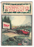 Copertina Touring Club Italiano Gennaio 1920 con pubblicità SKF. Un'auto d'epoca rossa su una strada di montagna accanto a un cartello SKF e al disegno tecnico di un cuscinetto.